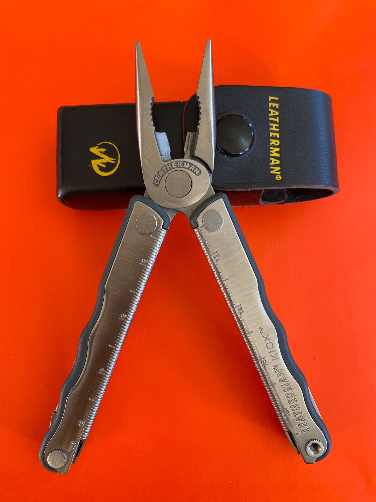 Leatherman KICK multitool. New, with vintage Leather Snap belt sheath