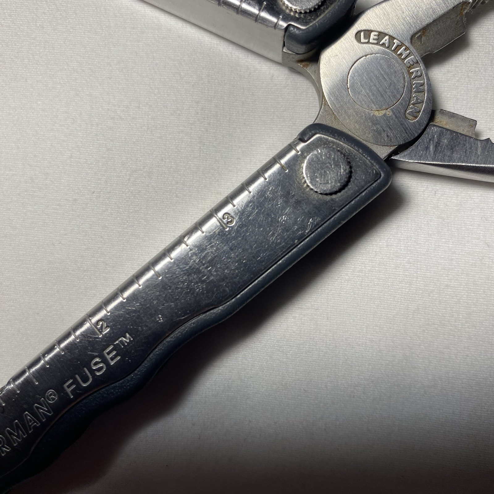 Leatherman Fuse Stainless Steel Folding Multi-Tool, Utility, Chips/Cracks