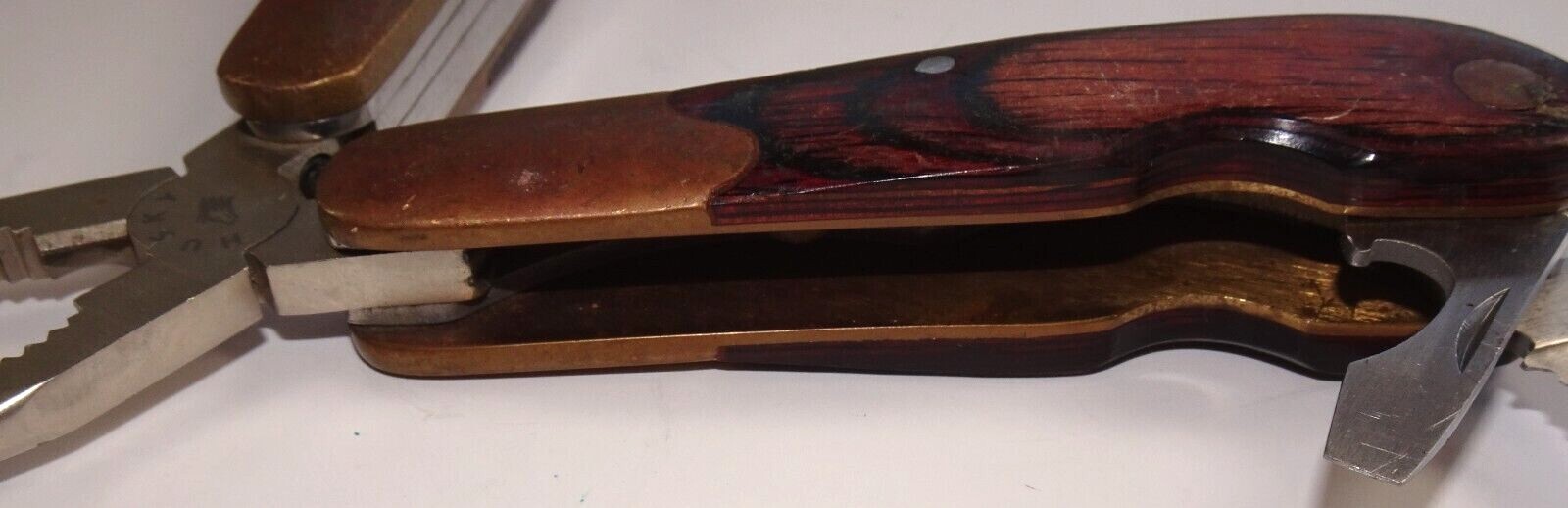 Husky Multi-Tool Knife Pliers Screw Drivers Ruler Saw Wood and Brass Handle