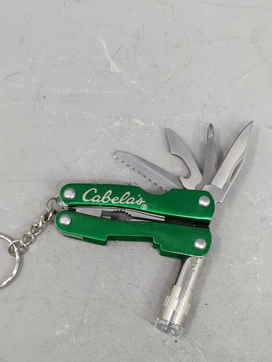 Cabela’s Green Multi-Tool with LED Light Pliers Knife Keychain * Needs Battery *