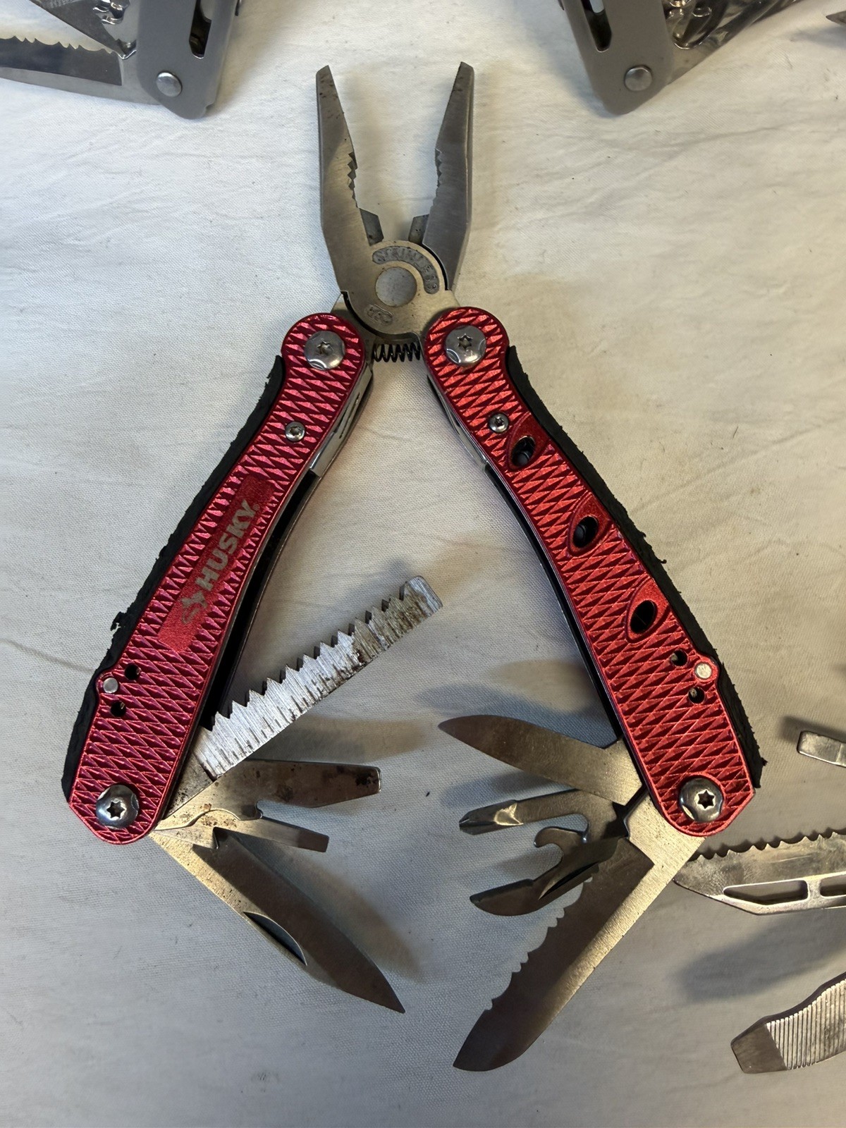 4 Multi-Tools / Pro-4 Tactical, Husky and 2 Unbranded / Good Variety of Tools