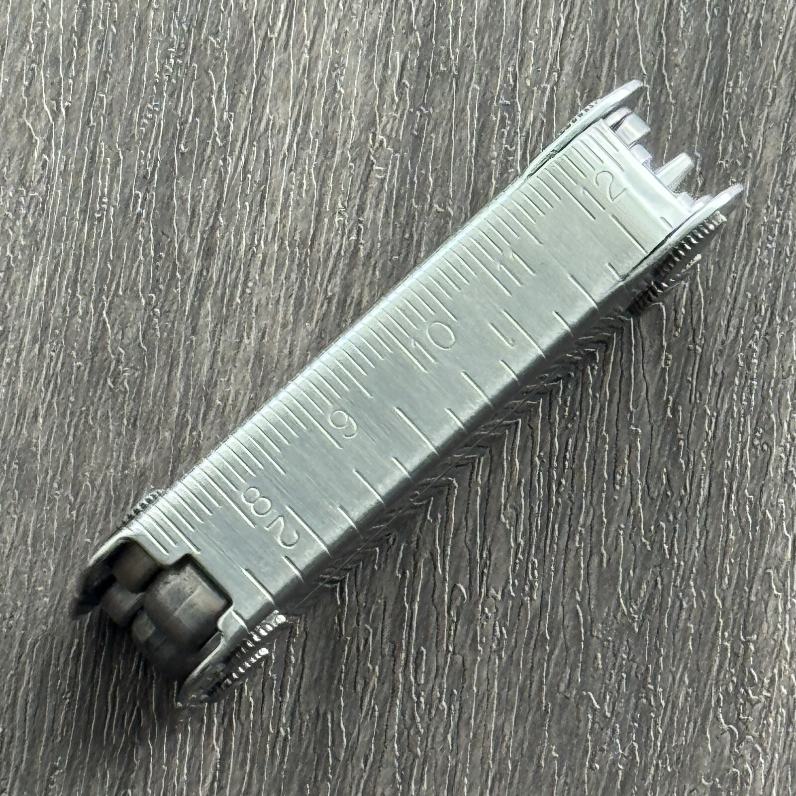 Leatherman MINI TOOL multitool. Variant w/US PAT 4744272 and a Blank side