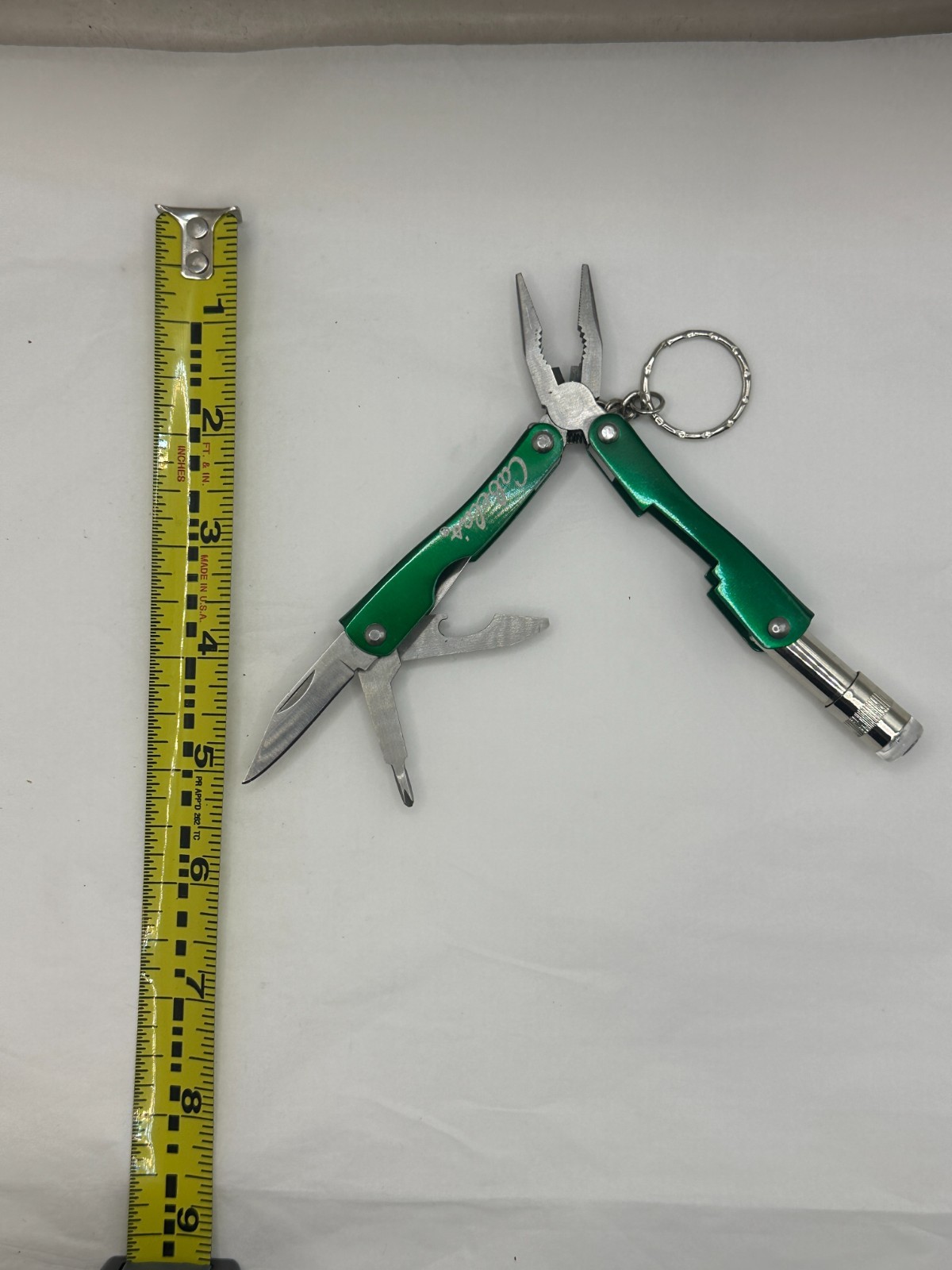 Cabelas Pocket Multi-Tool Flashlight Serrated Knife Can Opener Pliers 2 Drivers