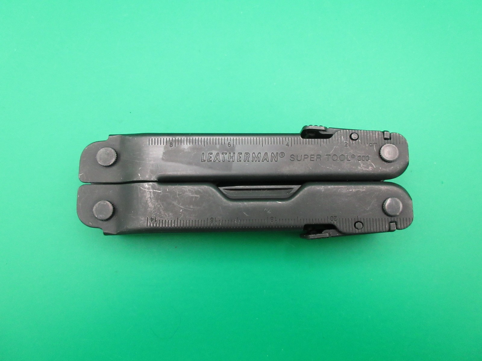 Leatherman Super Tool 300 Black Oxide Folding Multi Tool Knife Saw #60A