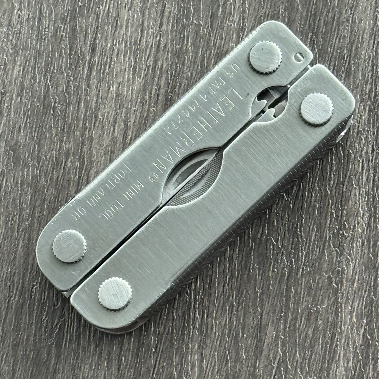 Leatherman MINI TOOL multitool. Variant w/US PAT 4744272 and a Blank side
