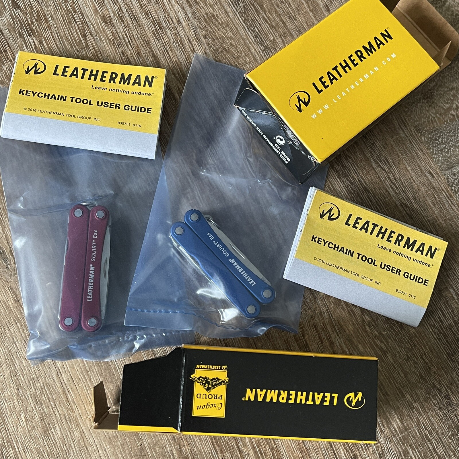 Set of two: Leatherman Squirt ES4 Blue & Squirt ES4 Red multitools. New