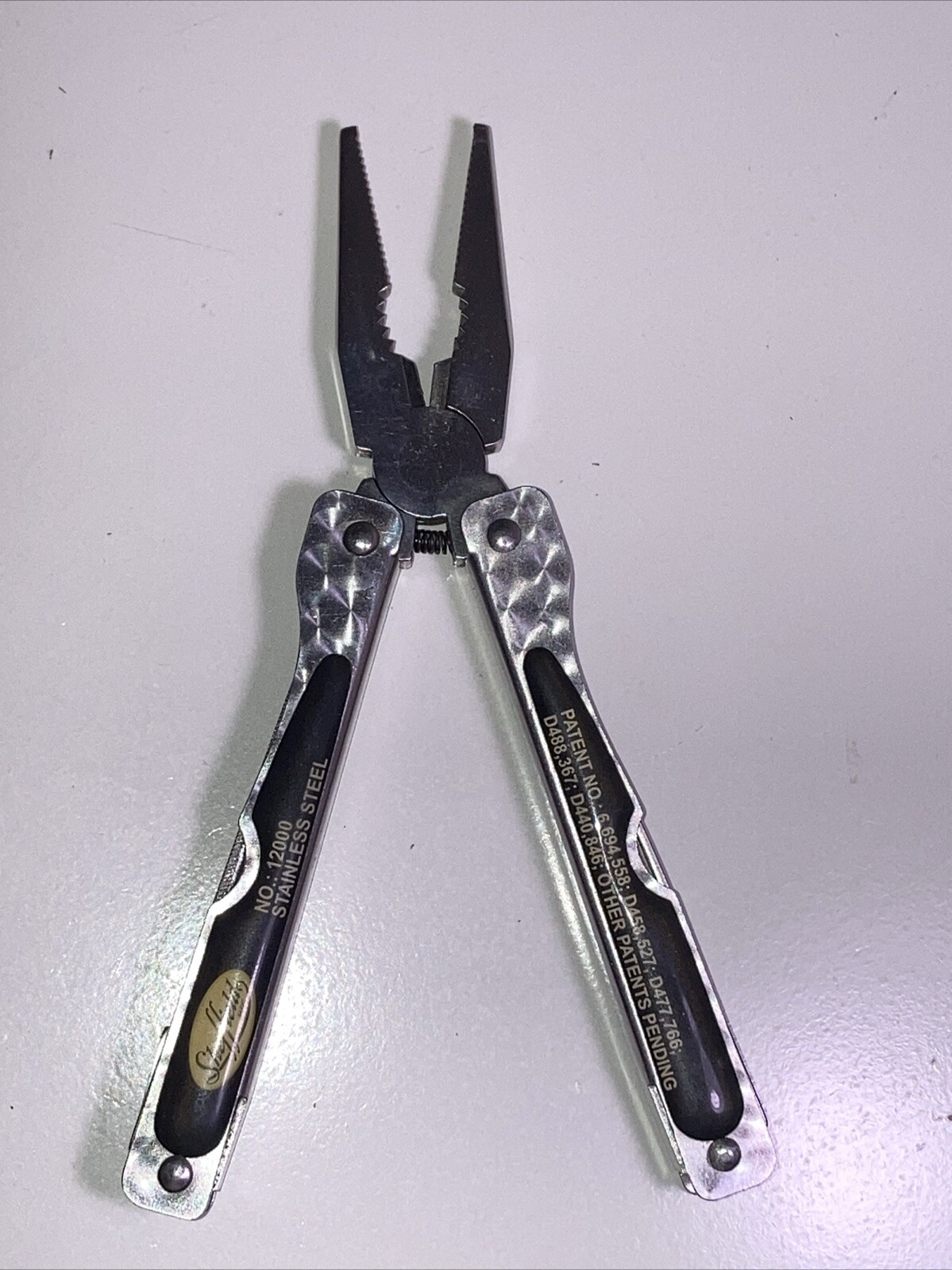 Sheffield N0. 12000 Multi Tool Fish Scaler Spring Loaded Needlenose Pliers
