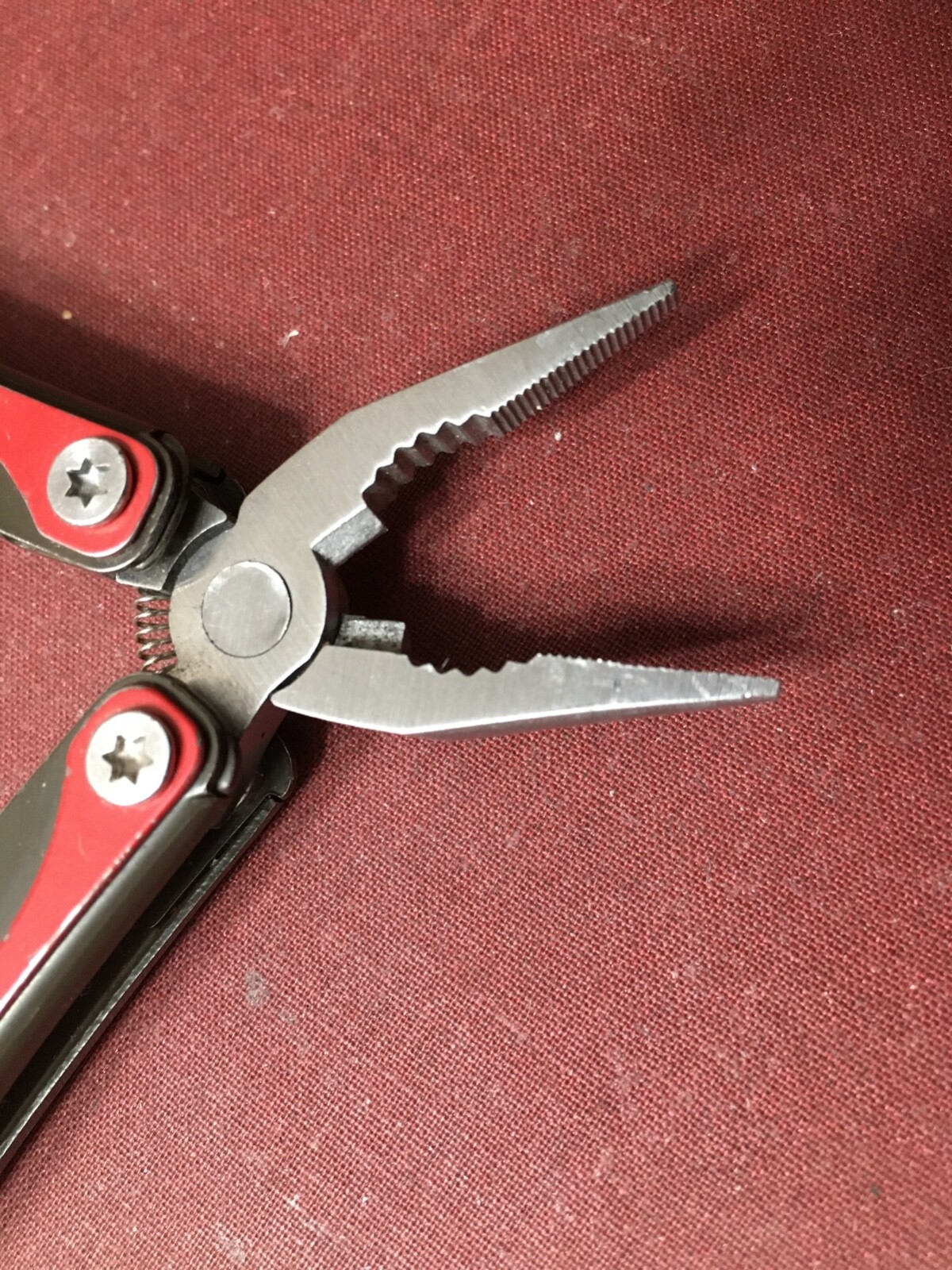 Cabela’s 4-1/2″ Multi-Tool in Red and Black with 7 Tools In One