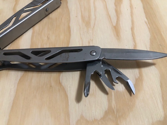 Ozark Trail (12 IN 1)stainless S multi tool with sheath -SILVER- Great Condition
