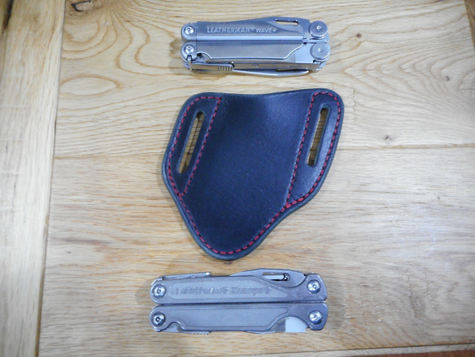 Leatherman Wave Black with red stitching Buffalo leather quick draw sheath.