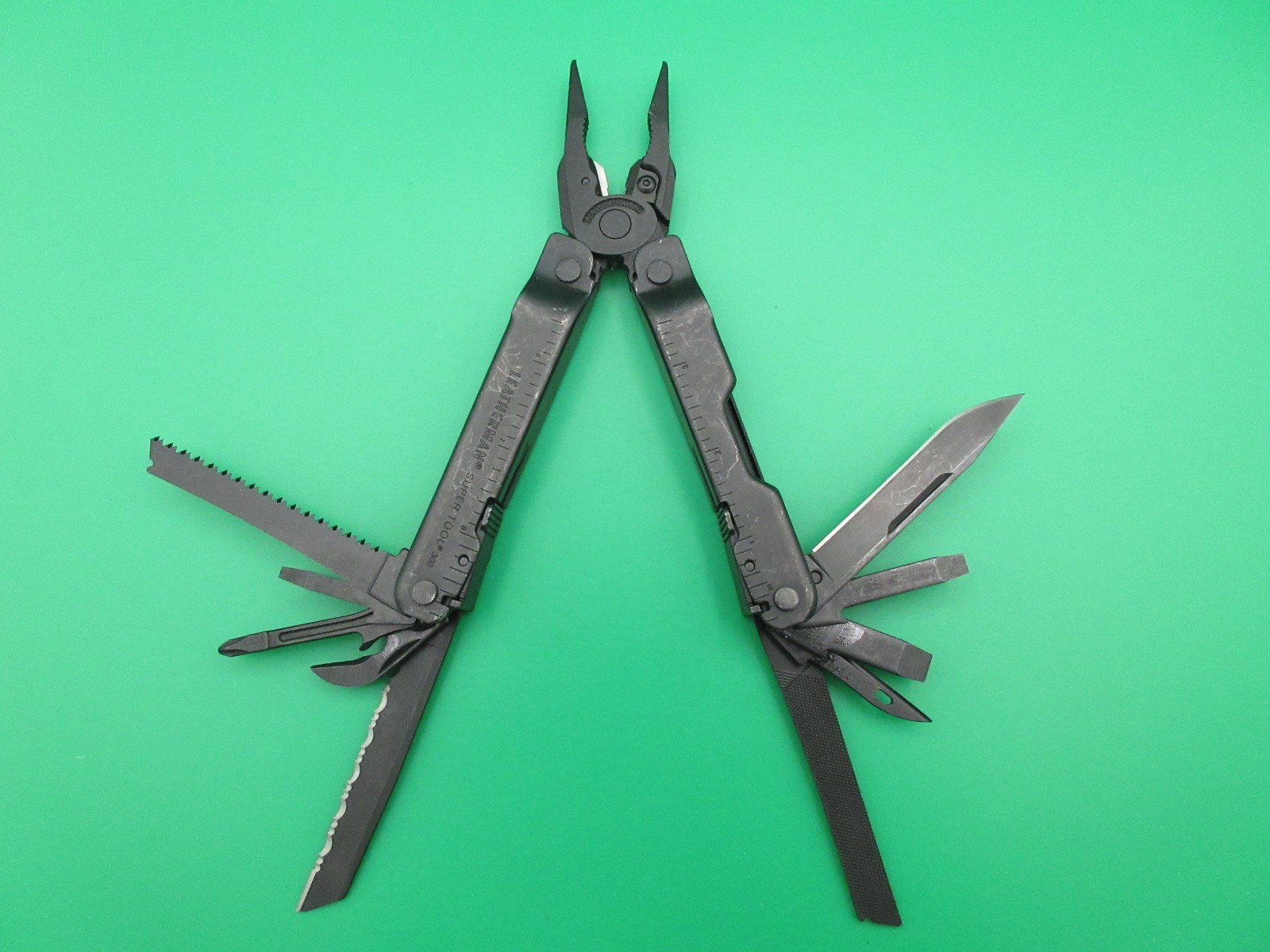 Leatherman Super Tool 300 Black Oxide Multi Tool Folding Knife USA #14A