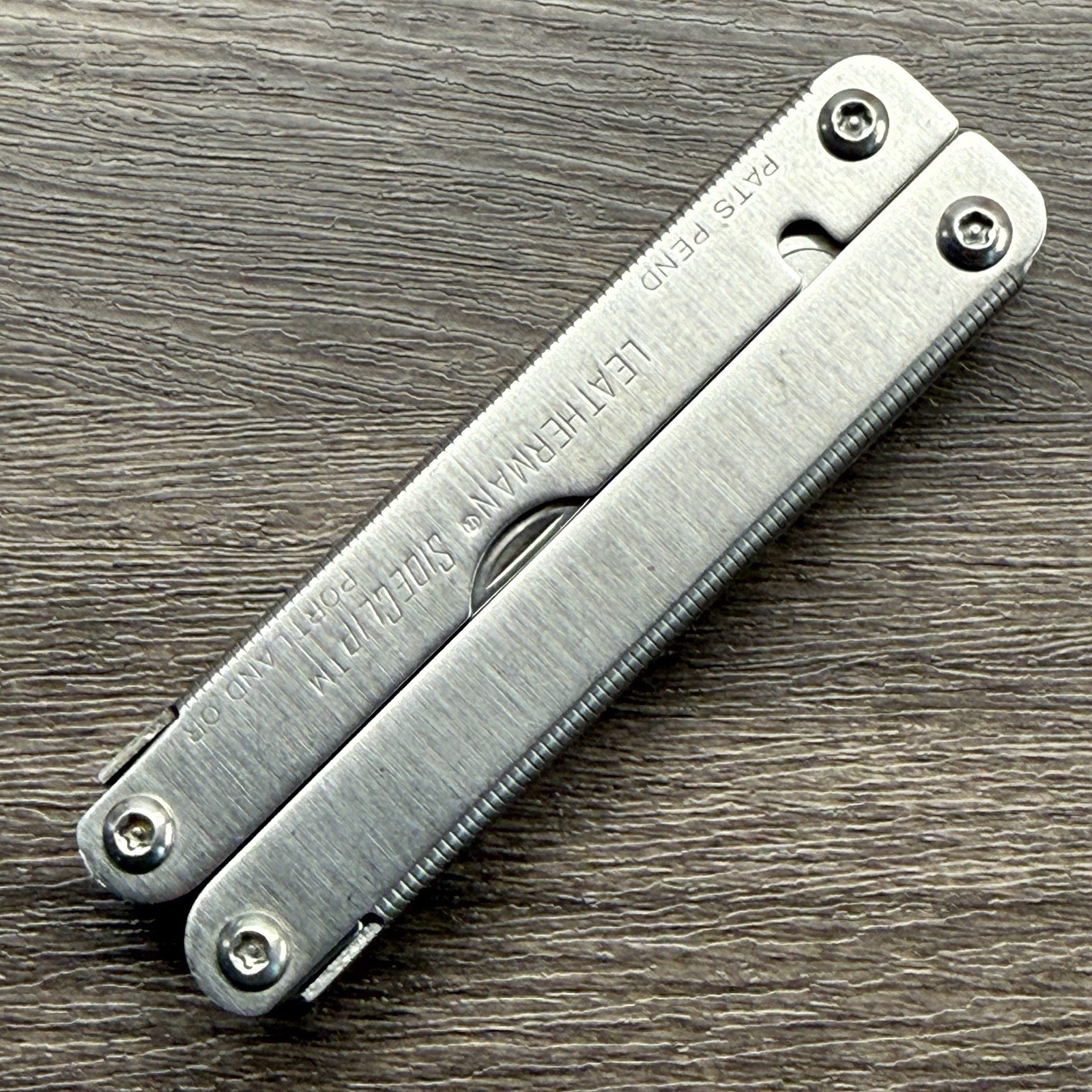 Leatherman Sideclip multitool. Lightly used. Late Run: shiny factory polished
