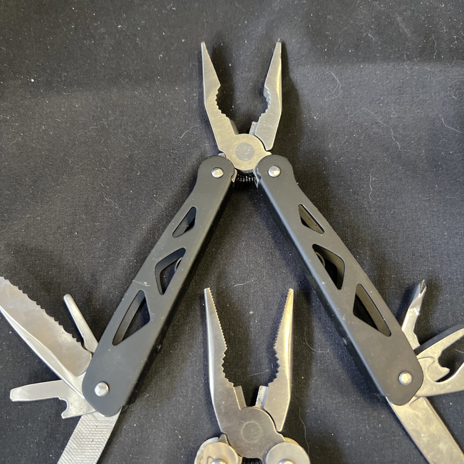 Set Of 3 Ozark Trail Trailside 12-in-1 Multitool – Black, Teal, & Camouflage