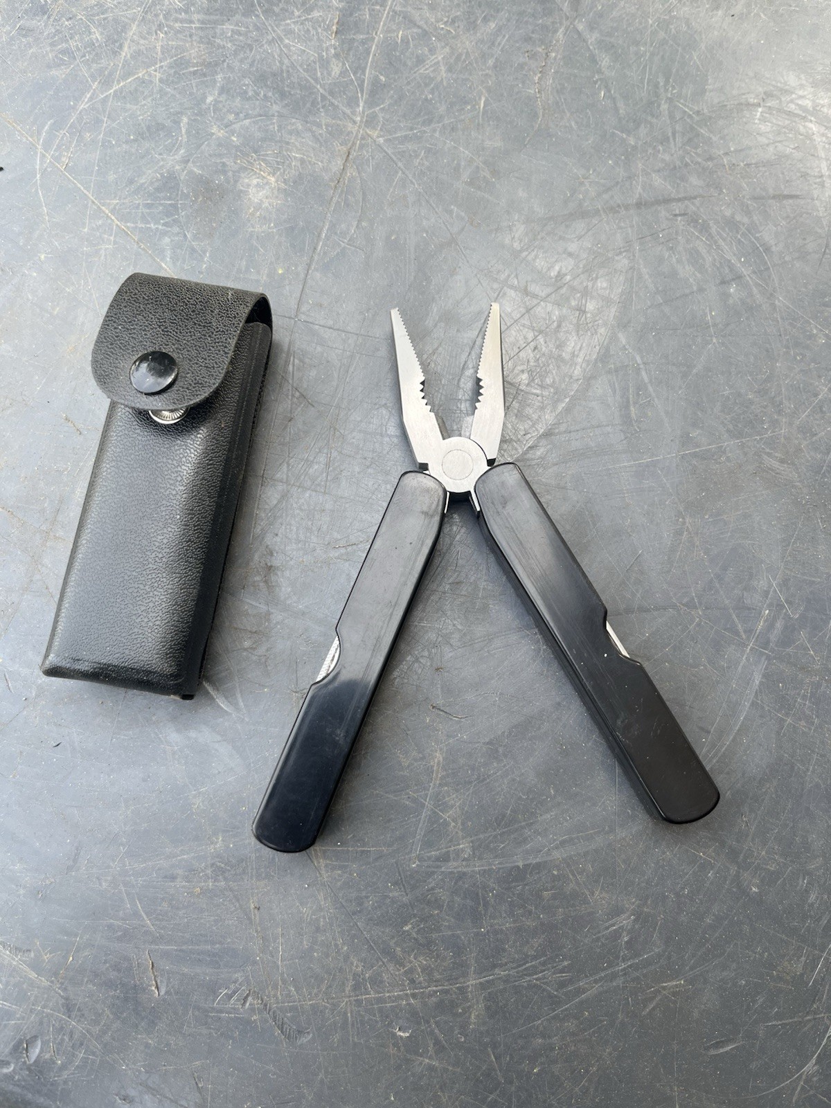 Multitool Stainless Steel Pliers W/ Black Handle And Multitool Pocketknife Black