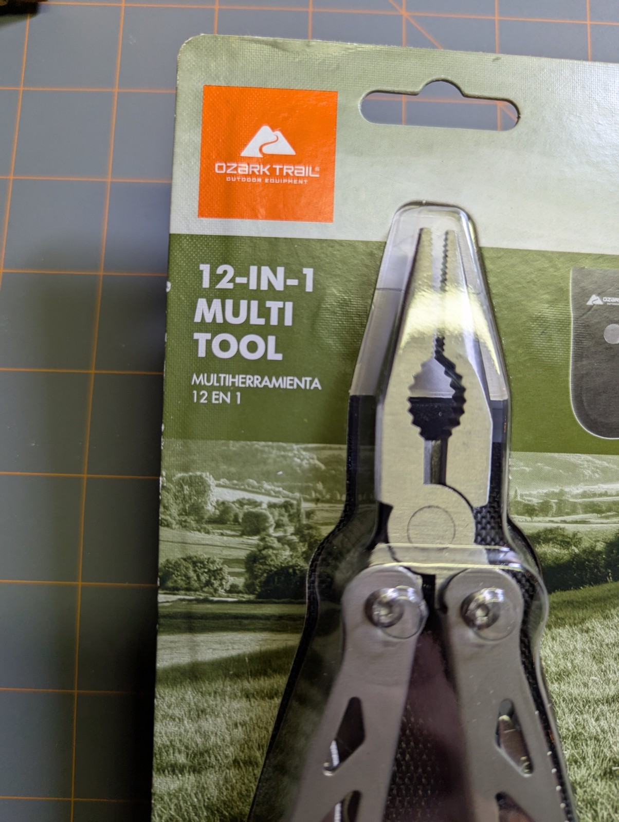 OZARK TRAIL 12-IN-1 MULTI- TOOL SHEATH INCLUDED BRAND NEW! FACTORY SEALED.