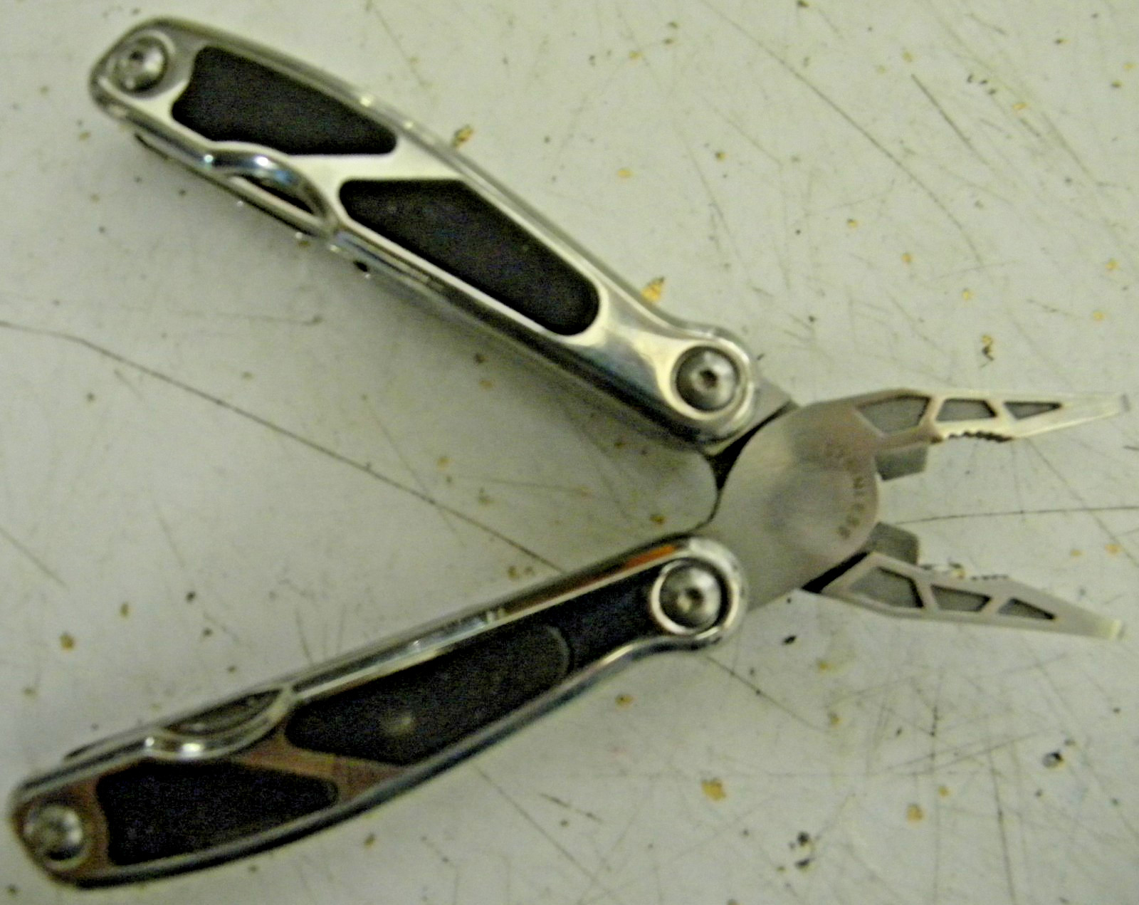 COAST Mini Multi Tool Silver and Black with built in LED and a Pocket knife