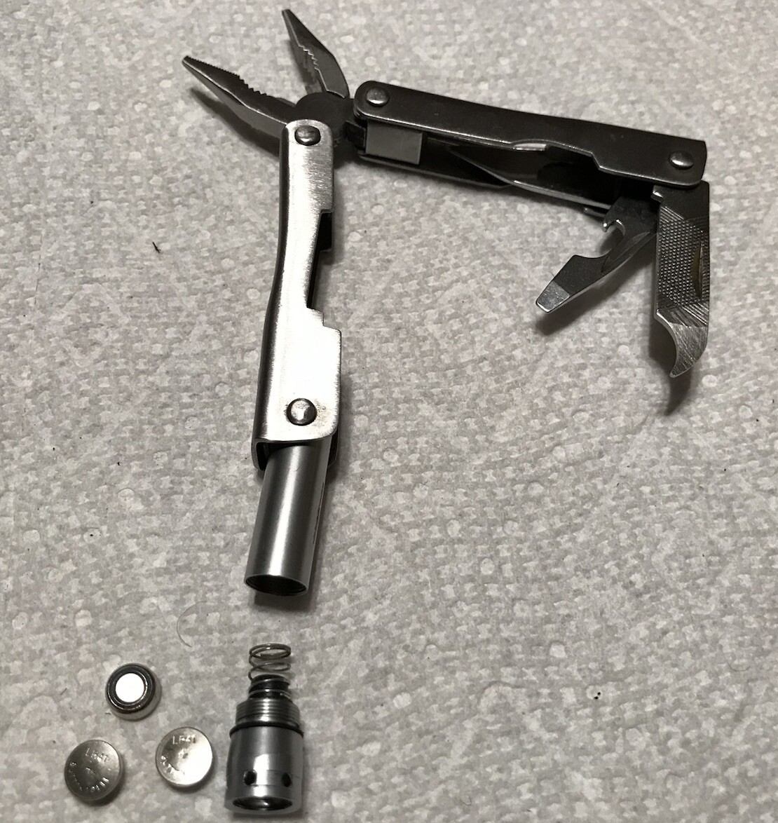 Unbranded Multi-tool, Pliers,saw knife & Battery Powered Light