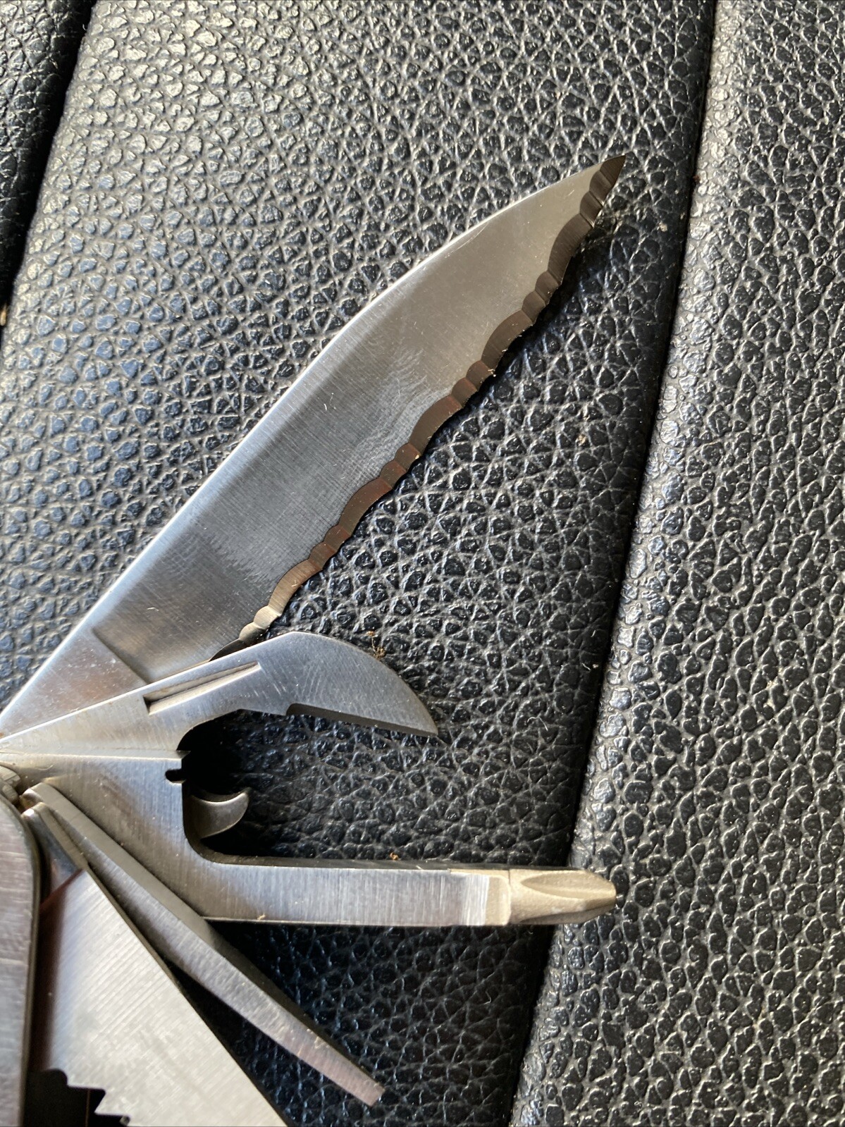 Multi-tool With Pocket Clip. Leatherman 832127 Rev Stainless Steel