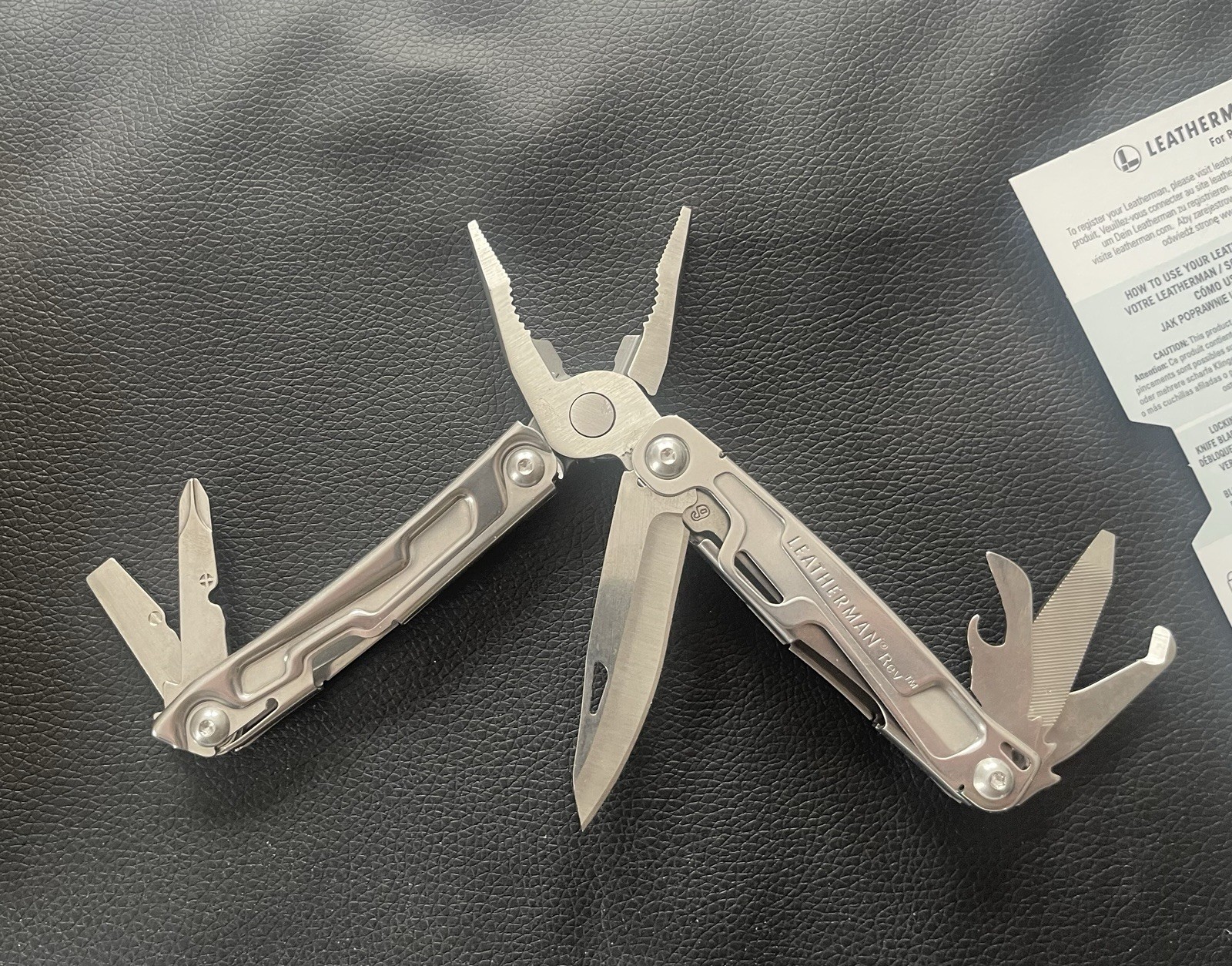 BNIB Leatherman Rev Multi Purpose 14 Tool Folding Pliers Pocket Knife Belt Clip
