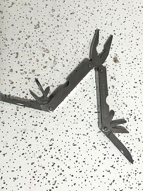 Vintage American Camper Stainless Steel Multi-Tool Pliers With Brown Sheath —