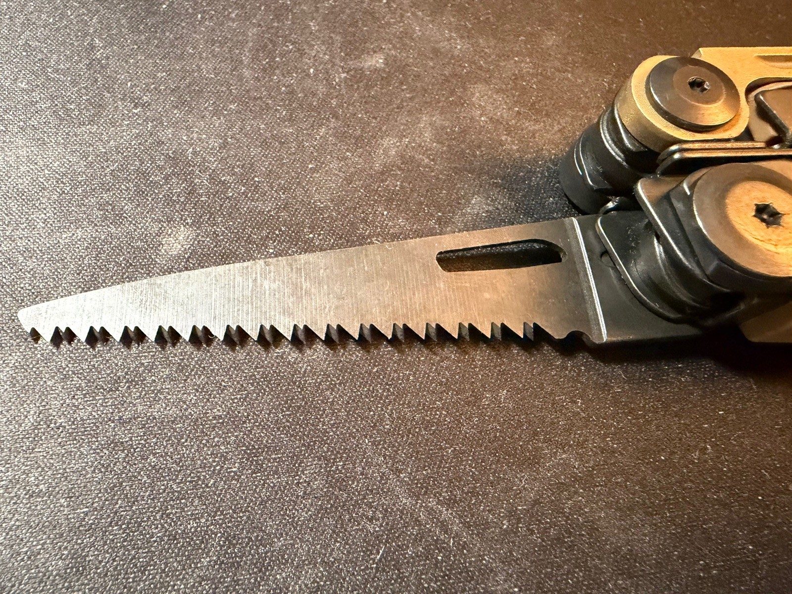 Leatherman MUT Black Titanium Clip multi tool brown sheath. 10/2011