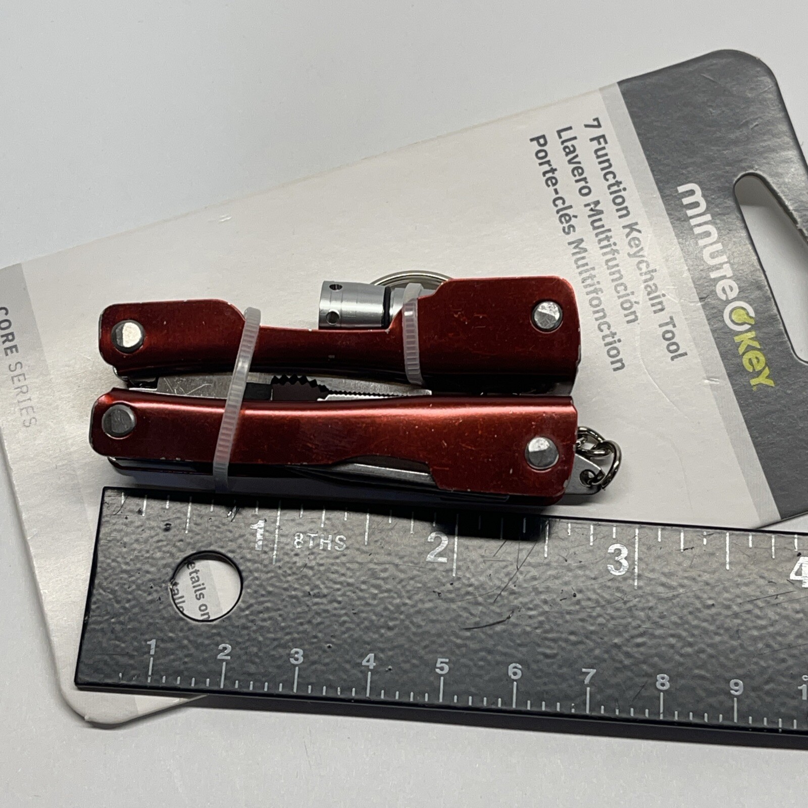 Key Chain Tool 7 Function Pliers Wire Knife Screwdriver Can Opener LED Light Red