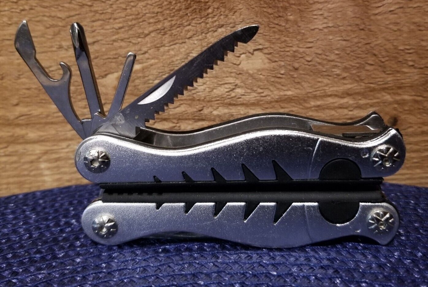 9-in-1 Stainless Steel Multi-Tool Pliers Knife Phillips File Serrated Blade