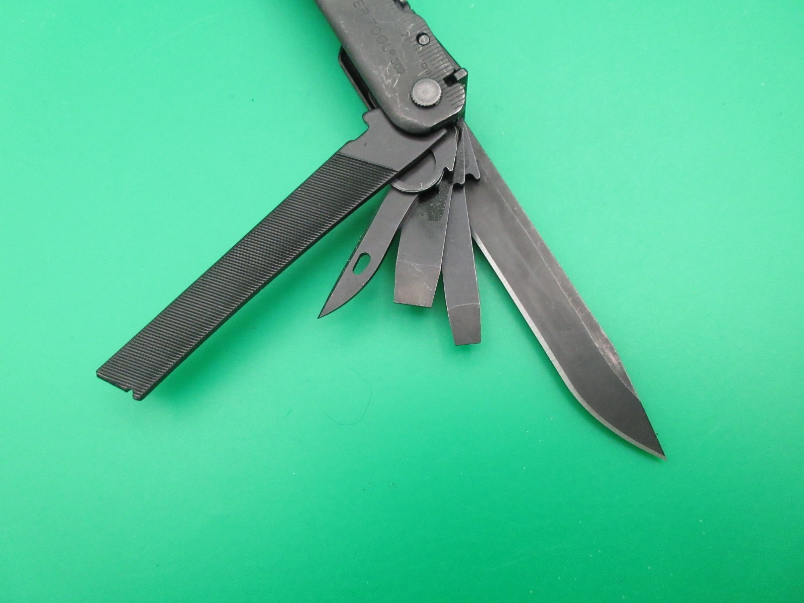 Leatherman Super Tool 300 Black Oxide Folding Multi Tool Knife Saw #60A