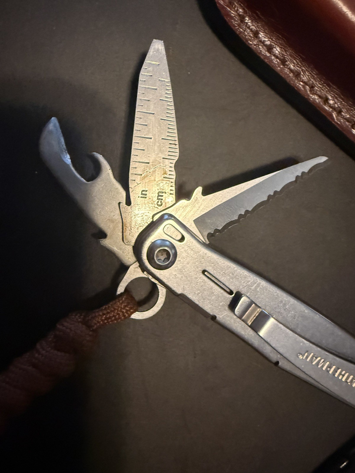 leatherman sidekick multi tool. With old timer genuine leather case. Lanyard