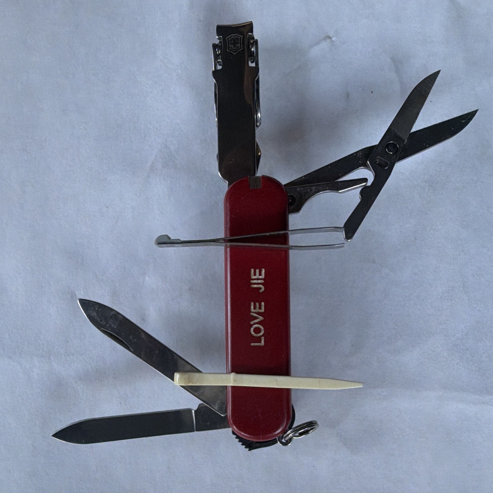 Victorinox Swiss Army 580 58mm Multi-Tool nail clippers Etching on both sides.