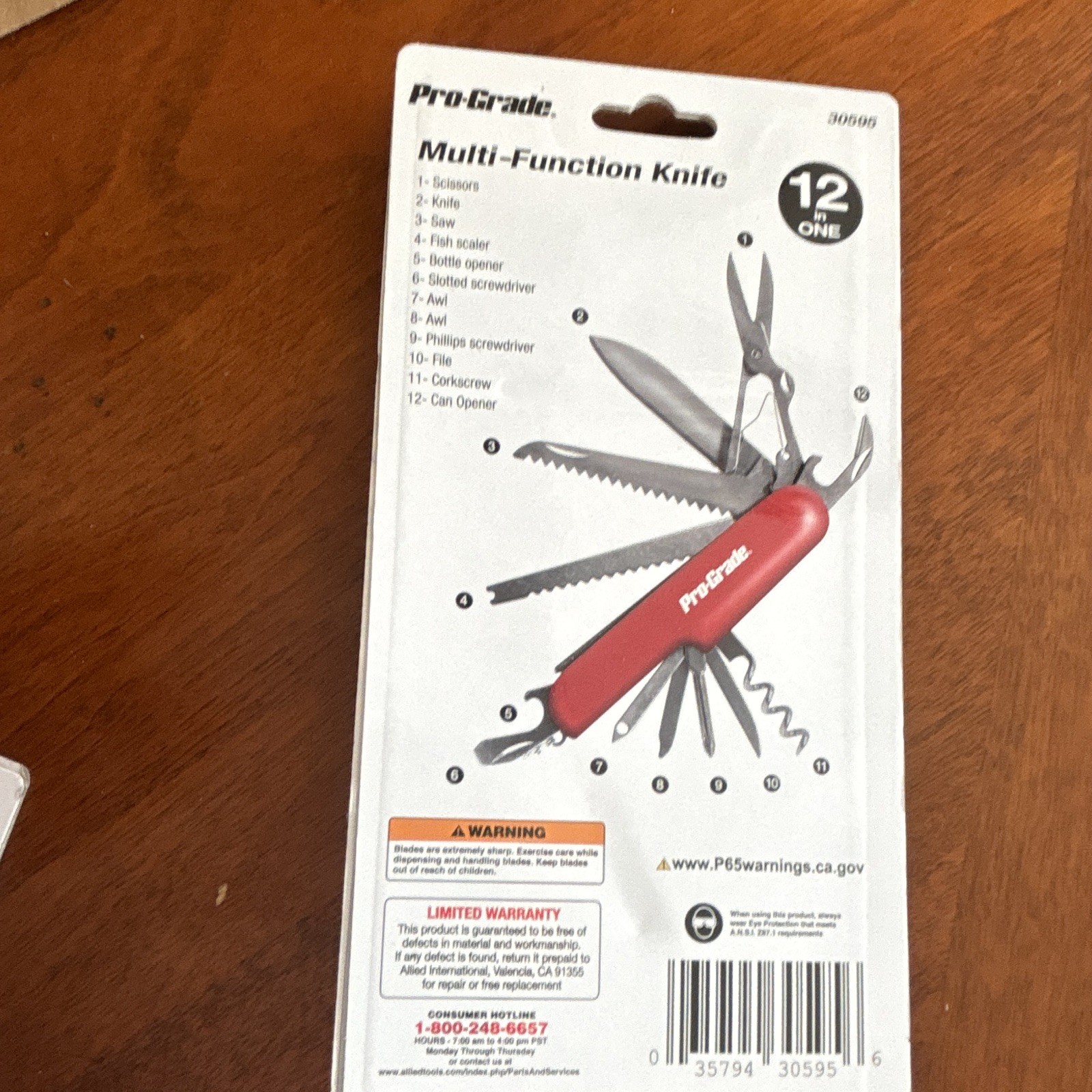Pro-Grade 12-in-1 Stainless Multi-Tool Red Scissors Saw Bottle Opener 30606