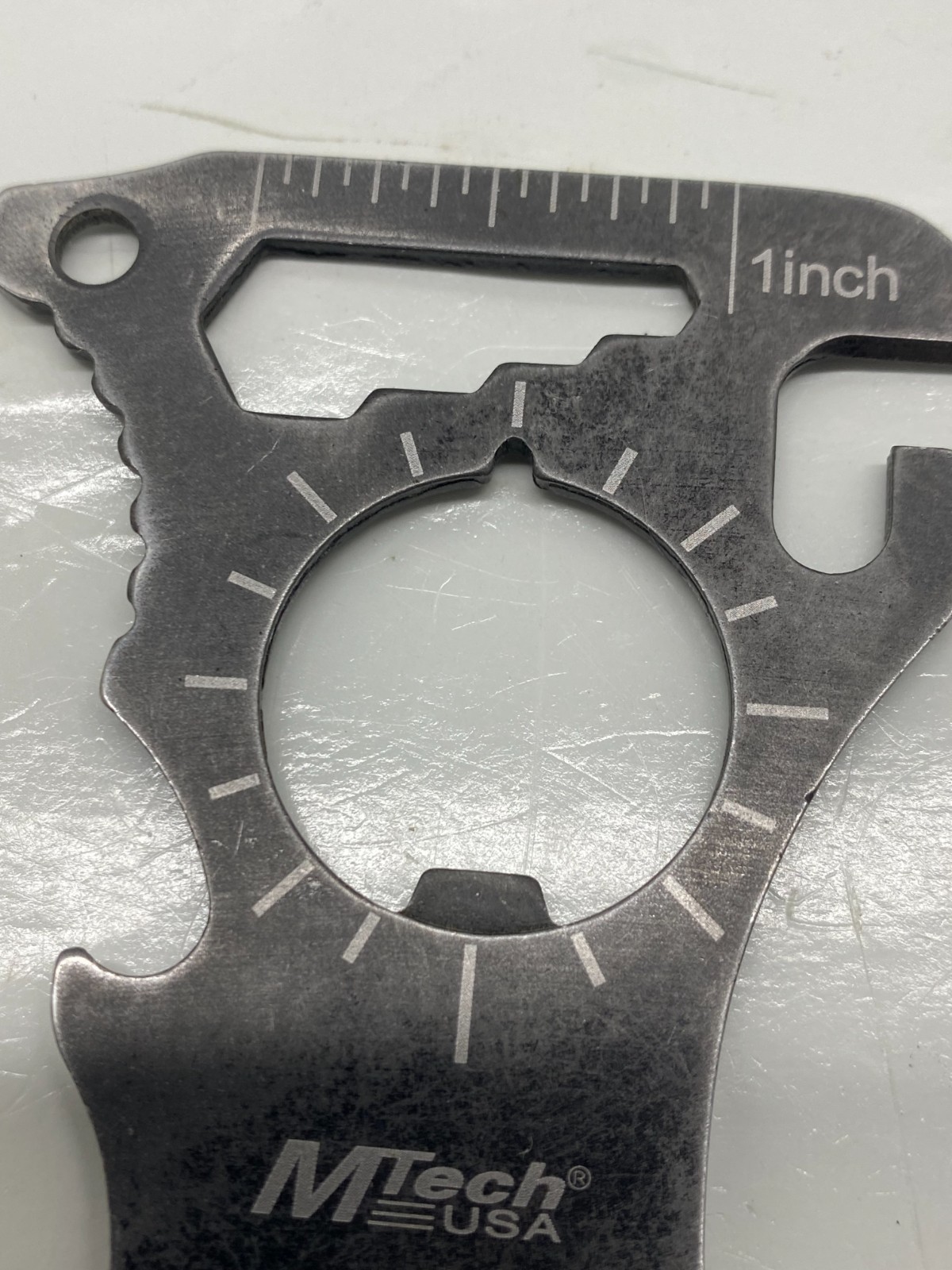 Compact MTech USA stainless steel survival spork multi-tool designed for camping