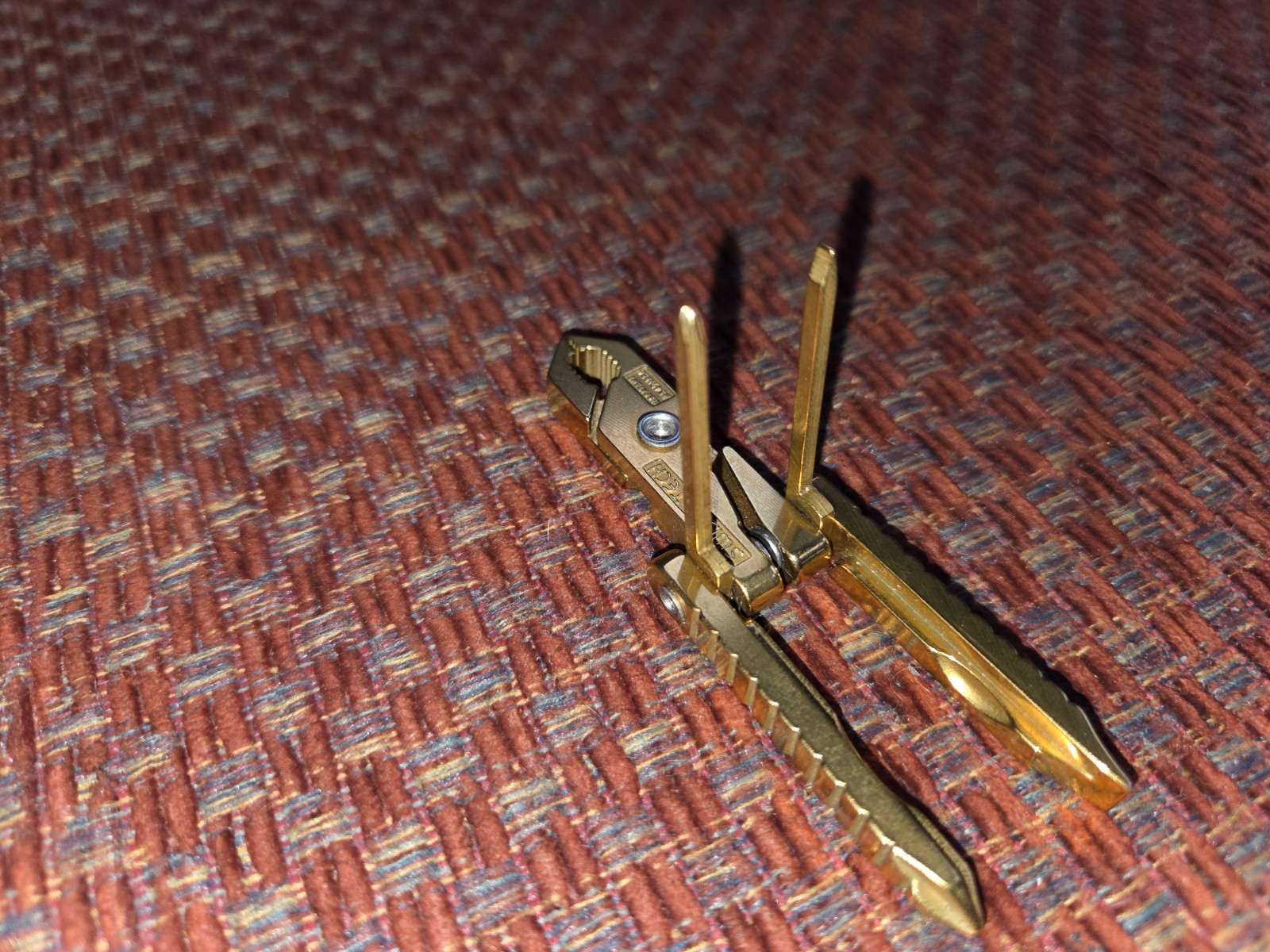 Swiss+Tech gold US patent #5491856 compact multi-tool