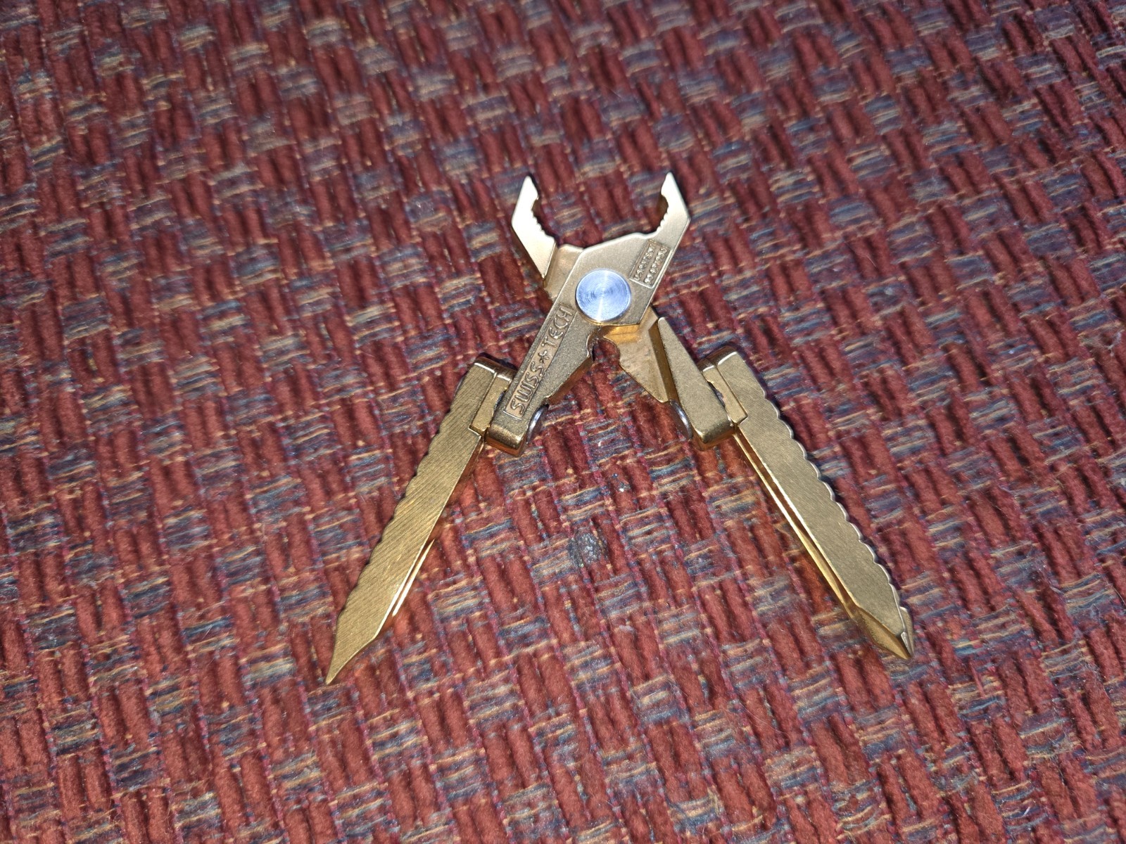 Swiss+Tech gold US patent #5491856 compact multi-tool