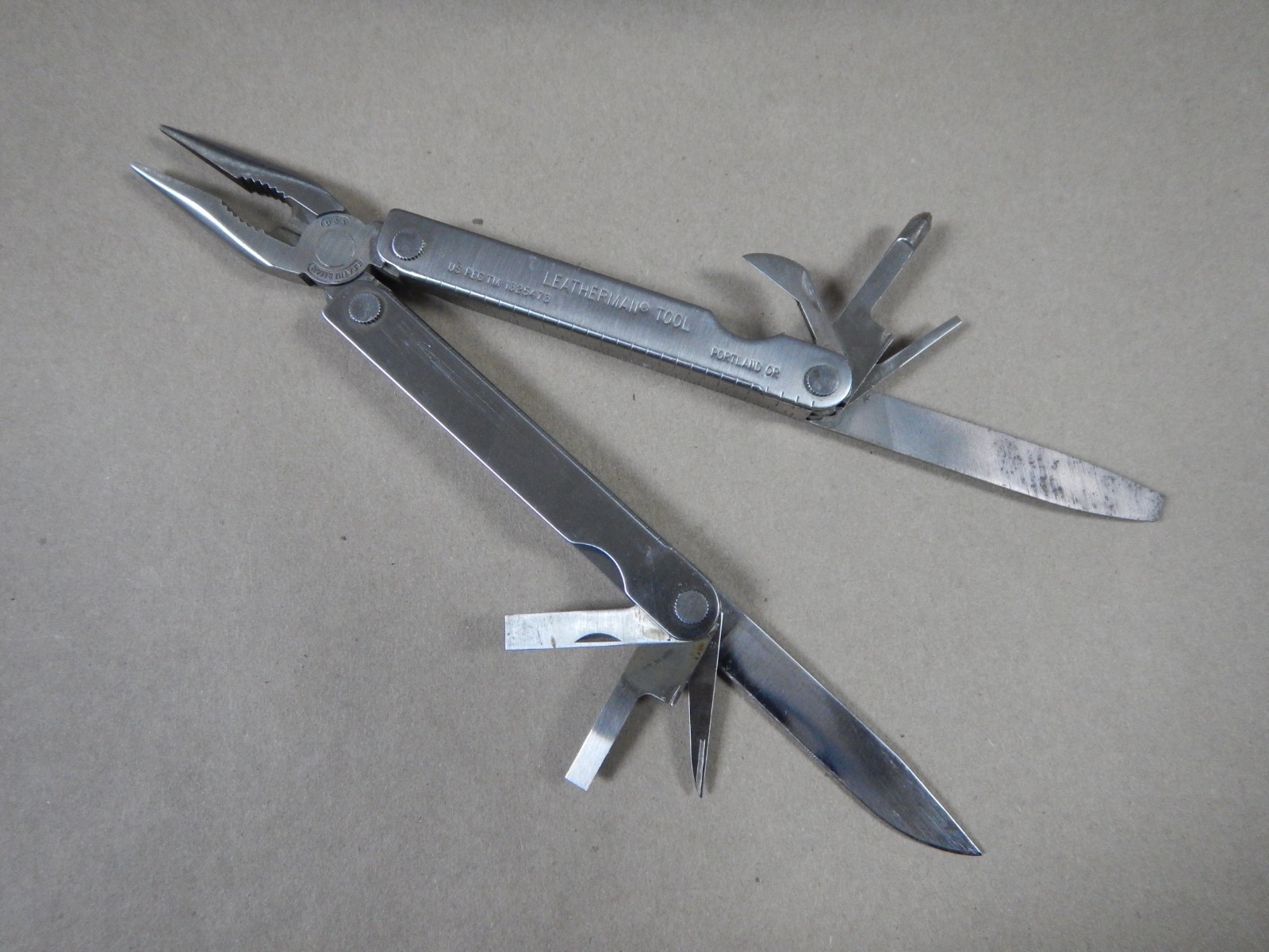 Original Leatherman Tool From The 90s with original leather sheath
