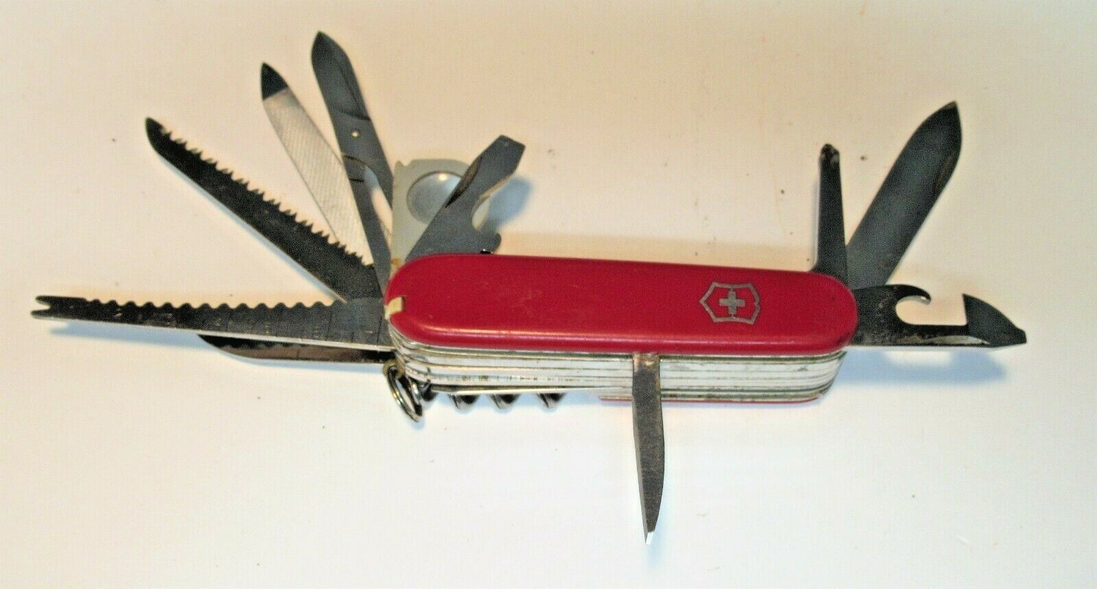 VINTAGE VICTORINOX SWISS ARMY KNIFE 16 TOOLS INCLUDING A MAG GLASS AND MORE !!