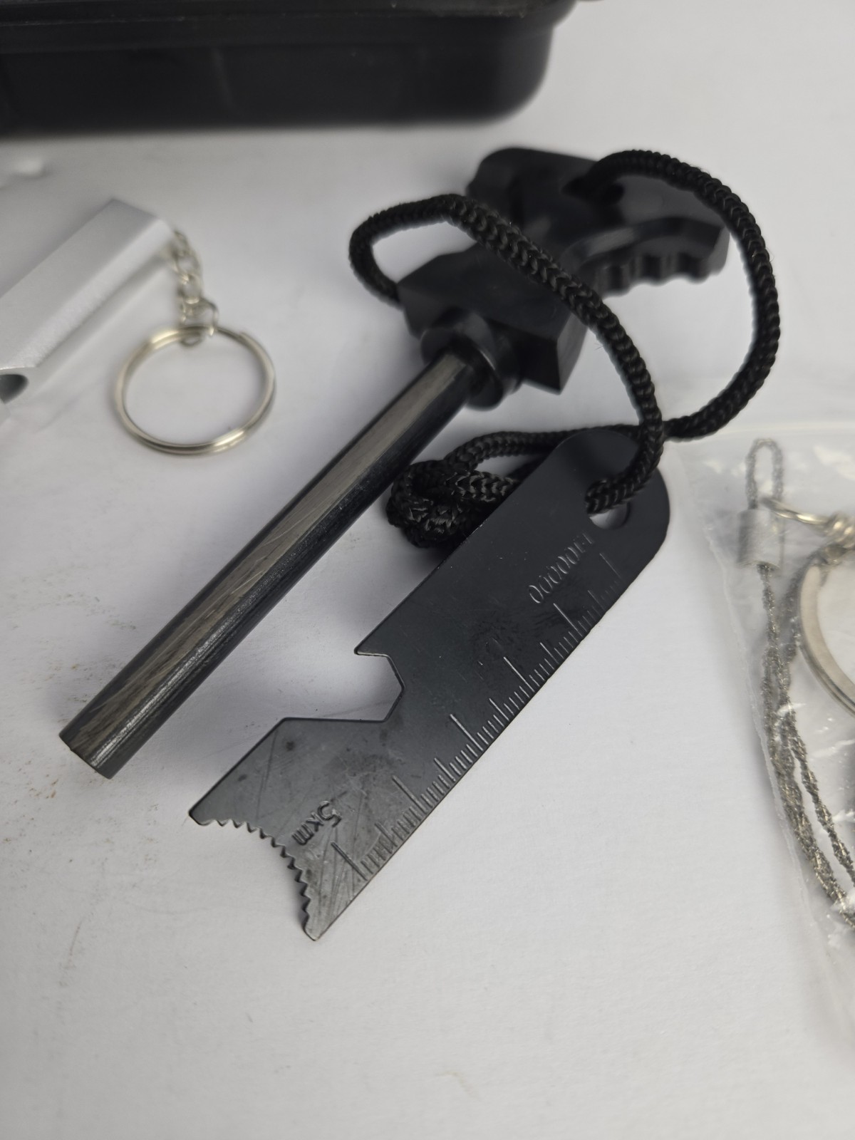 Survivor Tool Kit, Includes Fire Starter ,multi Tool ,knife ,whistle,cable Saw