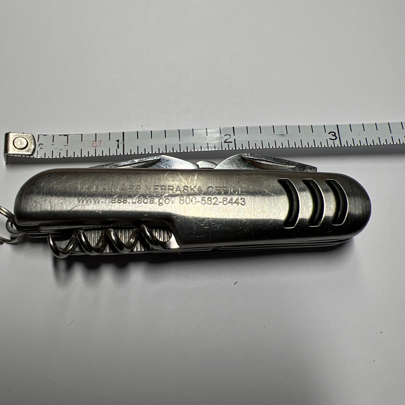 Stainless Steel Multi Tool 7-in-1 Pocket Knife Can Opener Corkscrew Scissors