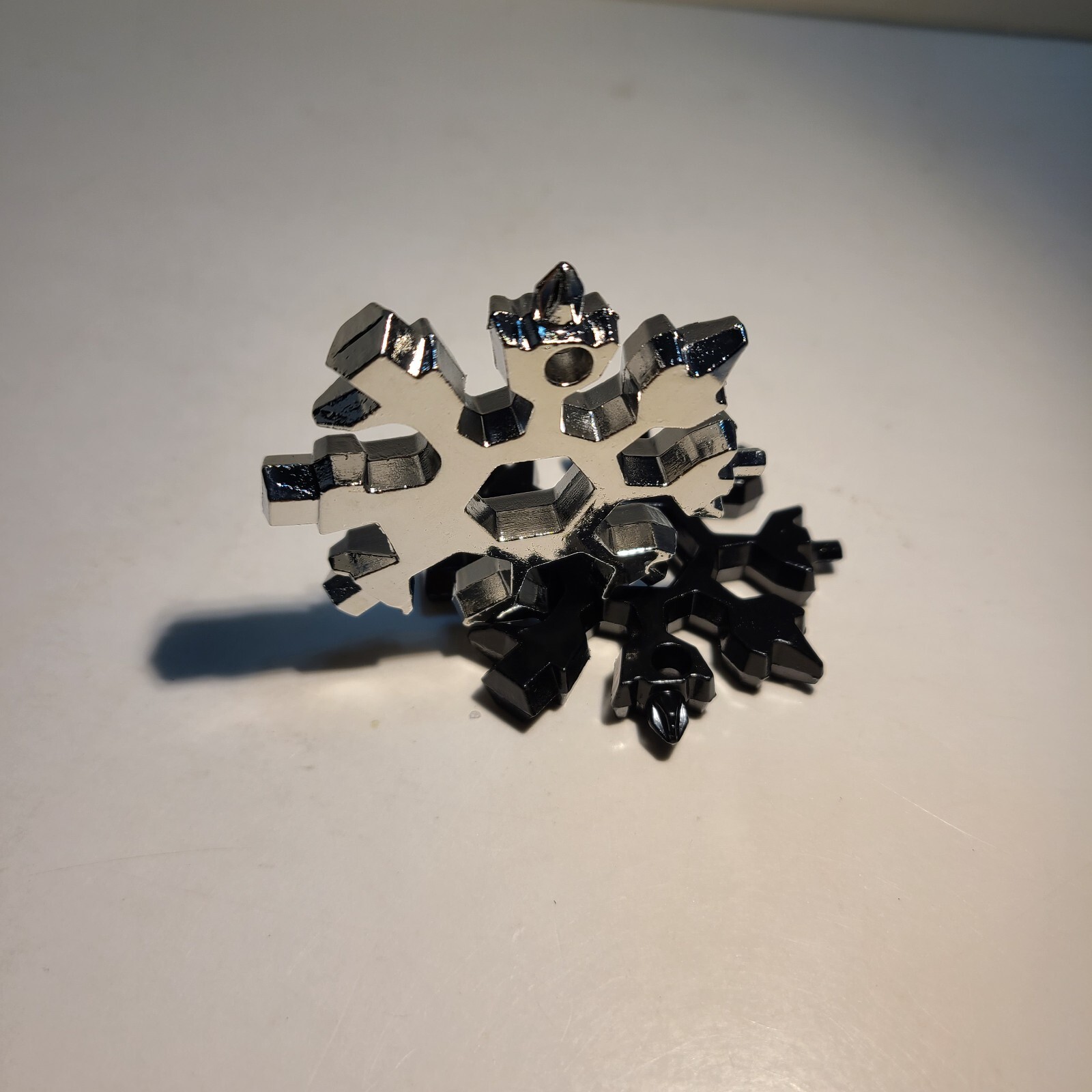 18-in-1 Stainless Steel Snowflake Multi-Repair Tool with Bottle Opener, etc.