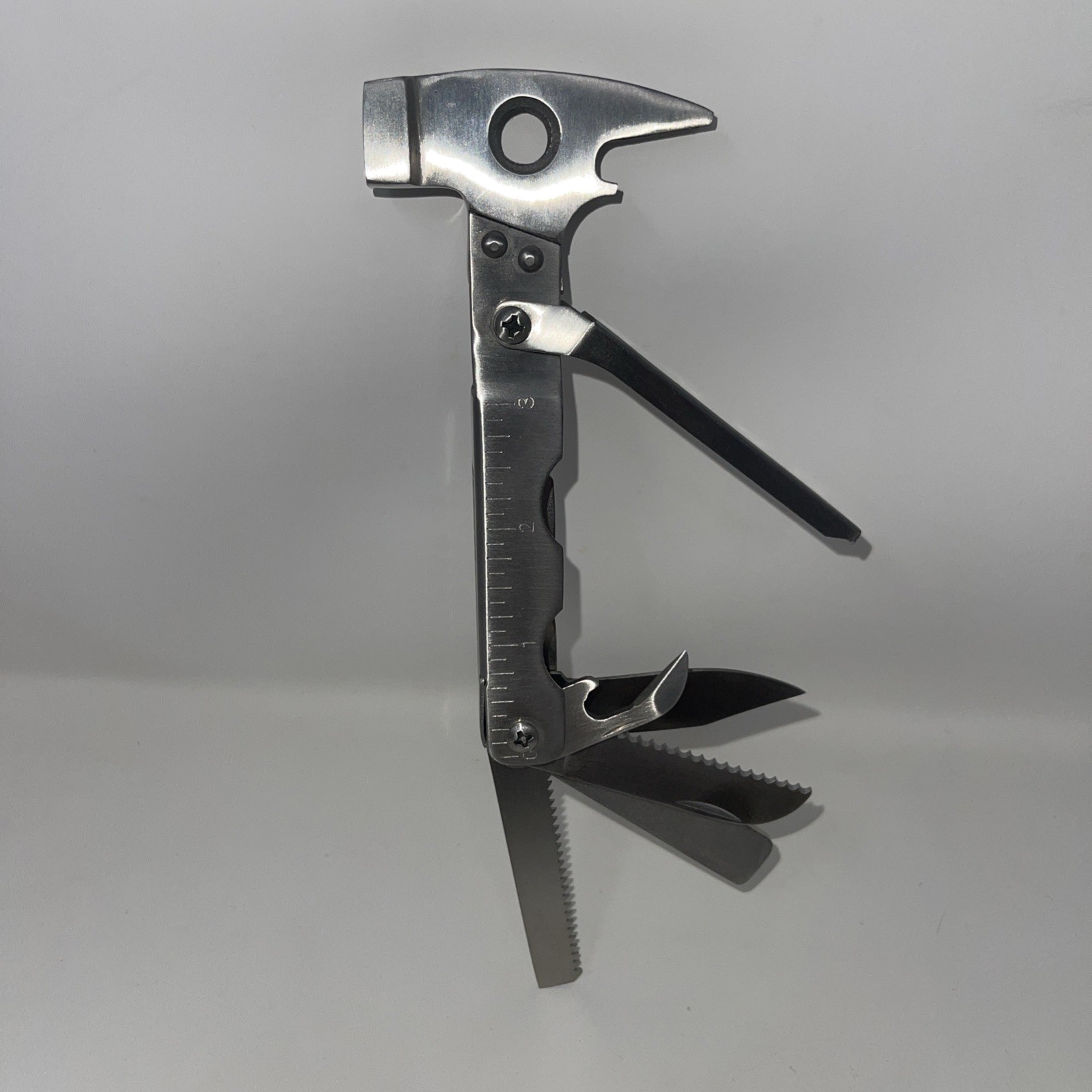 Multi-Tool Hammer Saw Serrated Knife Filer Hex Drivers Ruler Bottle Opener…