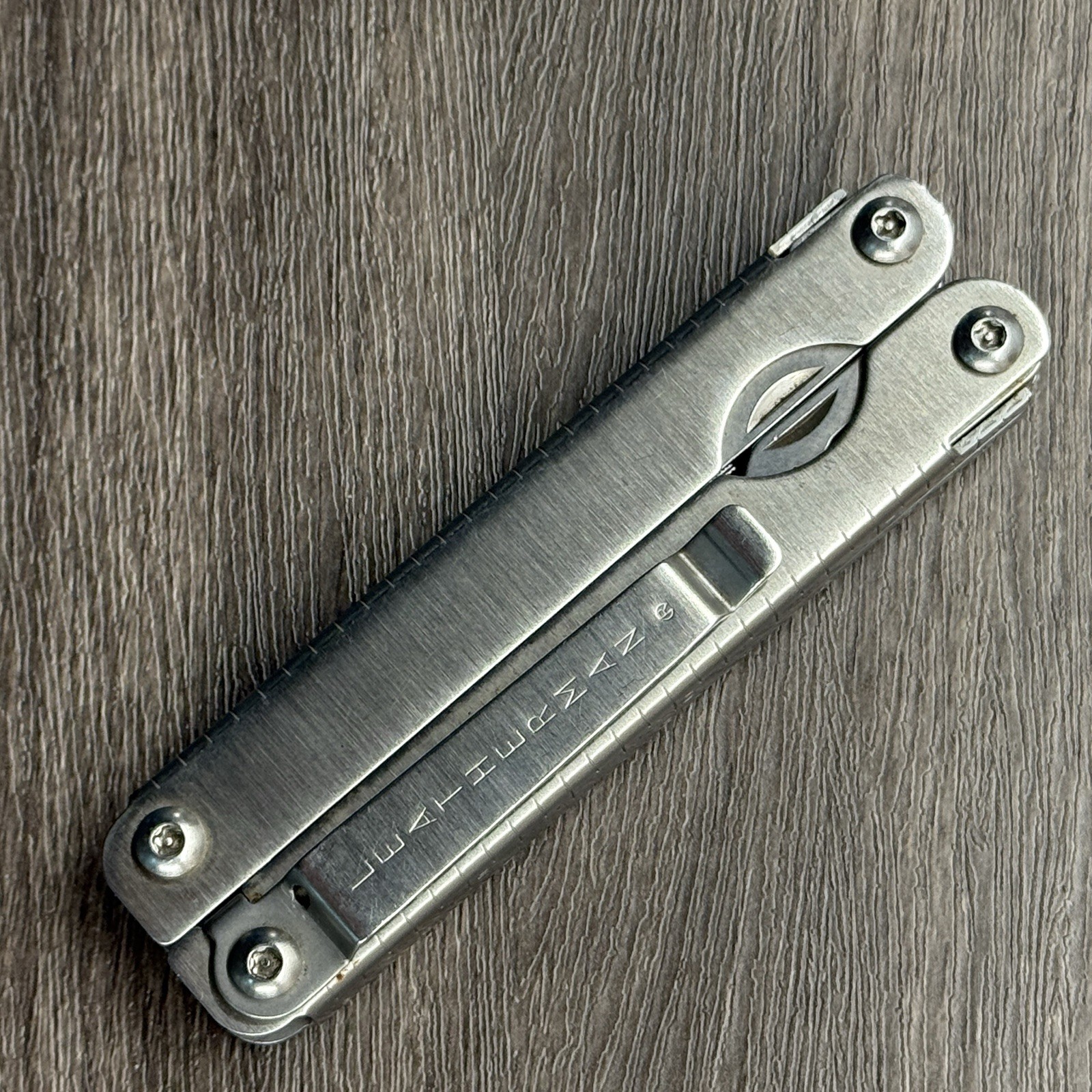 Leatherman Sideclip multitool. Lightly used. Late Run: shiny factory polished