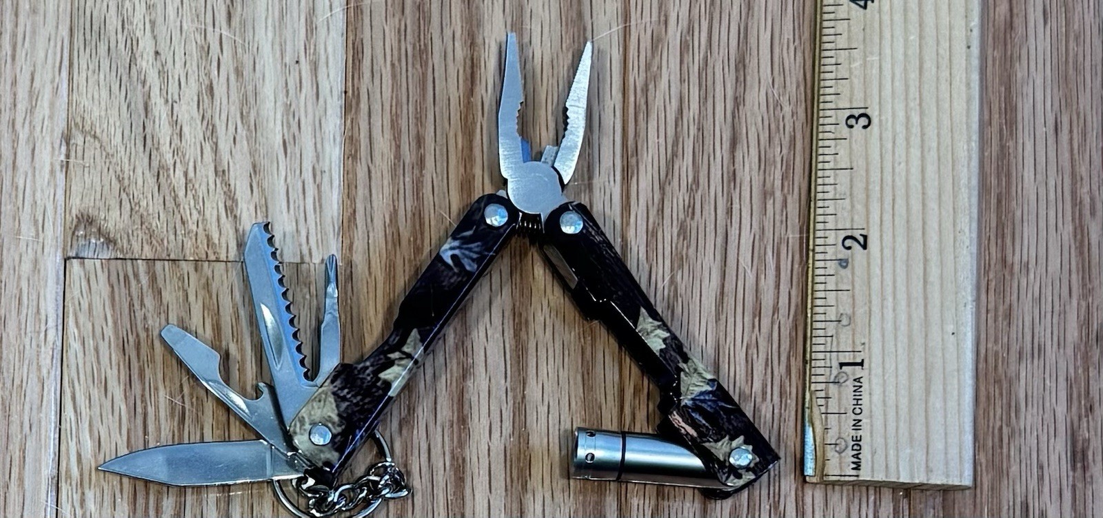 Camouflage Multi-Tool Flashlight Knife Pliers Key Chain Screwdriver Bottle Opene