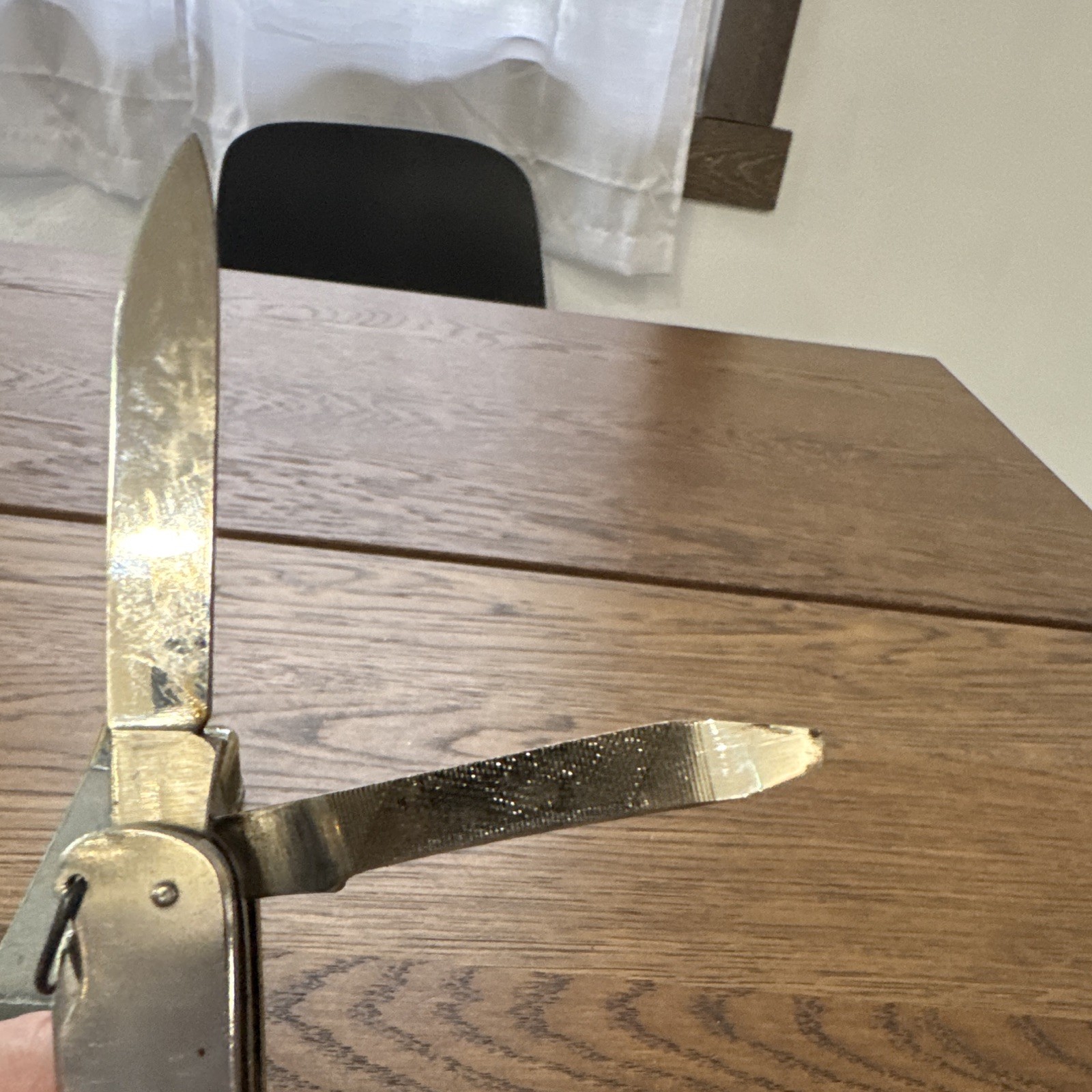 This is a vintage all-steel Japanese multitool, dating from the 1950s