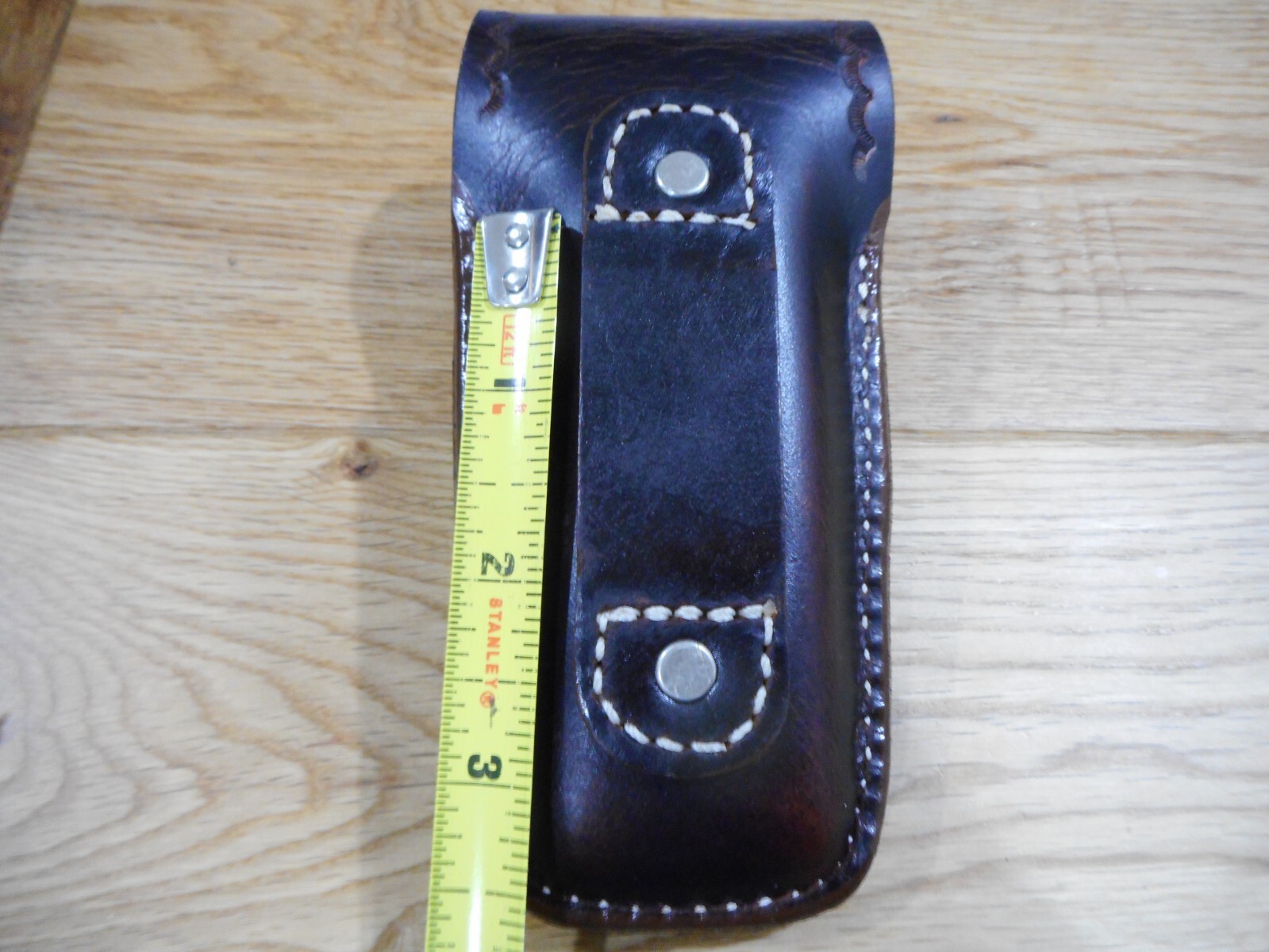 Leatherman Surge. Crazy Horse leather sheath. Tooled flap. Sheath only.