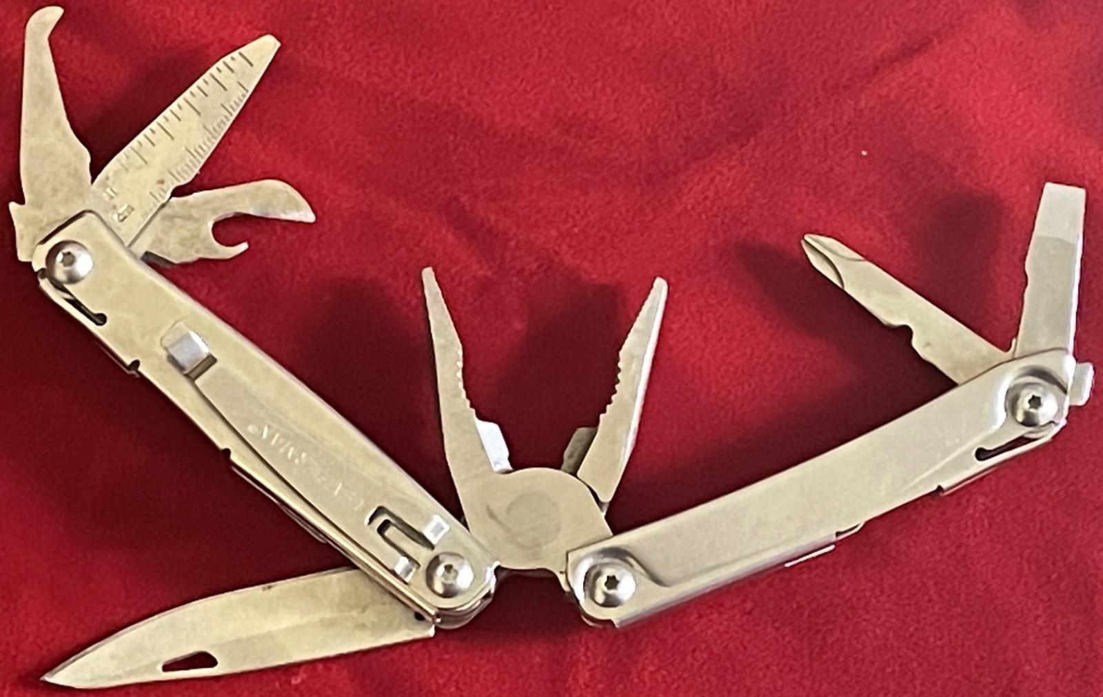 Leatherman Rev 11 Function Stainless Steel Multi-Tool W/Pocket Clip