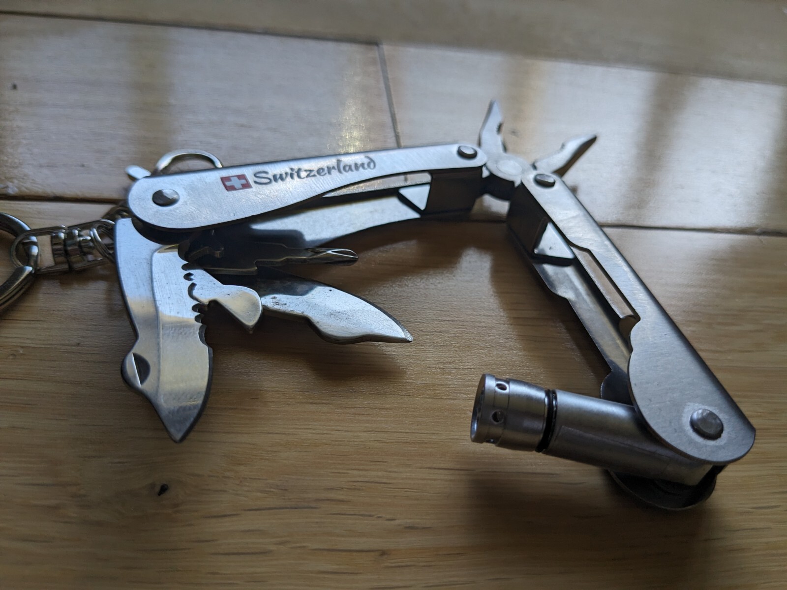 Swiss-Made Foldable Pocket Multi-Tool Stainless Steel w Pocket Clip. 8 Functions