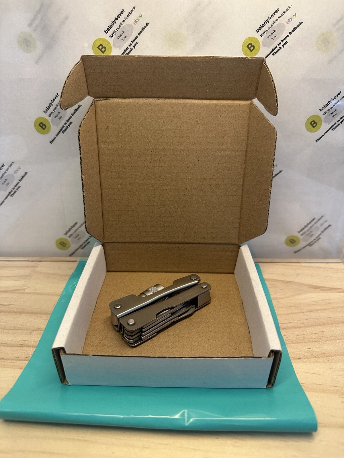Brookstone 7 in 1 Mini Multitool With Knife Scissors And Pliers Needs Bulb