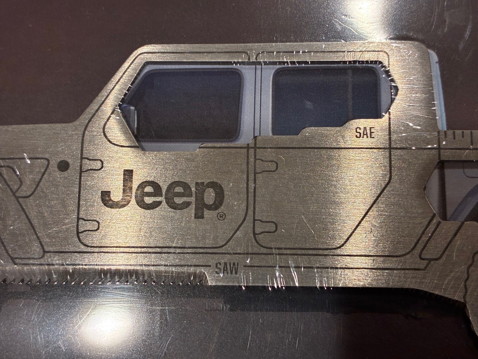 2020 Jeep Gladiator Brochure / Multi-tool: Driver Metal Saw Bottle Opener Wrench