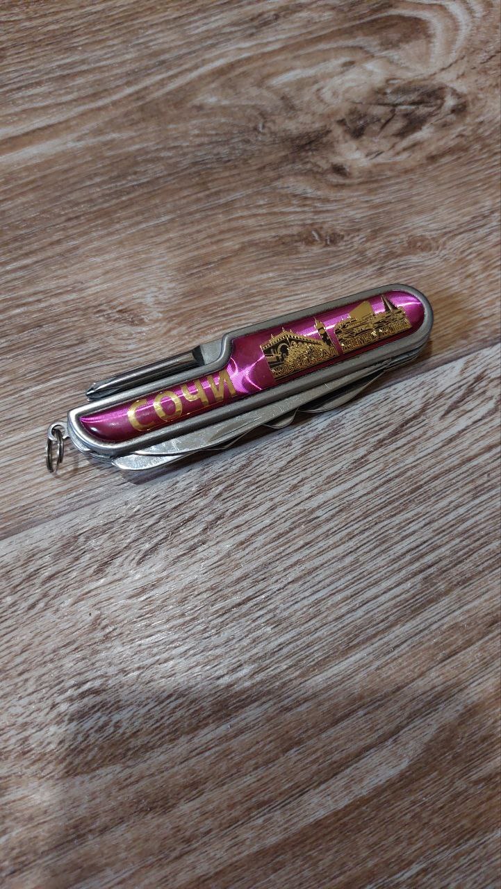 Tourist multitool knife 10 in 1, knife, corkscrew, screwdriver, scissors. Sochi