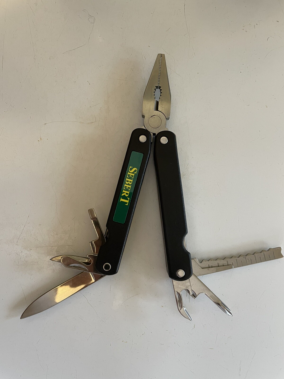 Barlow multi tool. New In Box With Pouch. Sebert Landscaping Logo.